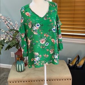 Cold shoulder flare top
